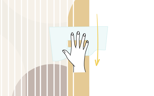 Dessin d'une main marouflant un lé à l'aide d'une spatule à maroufler