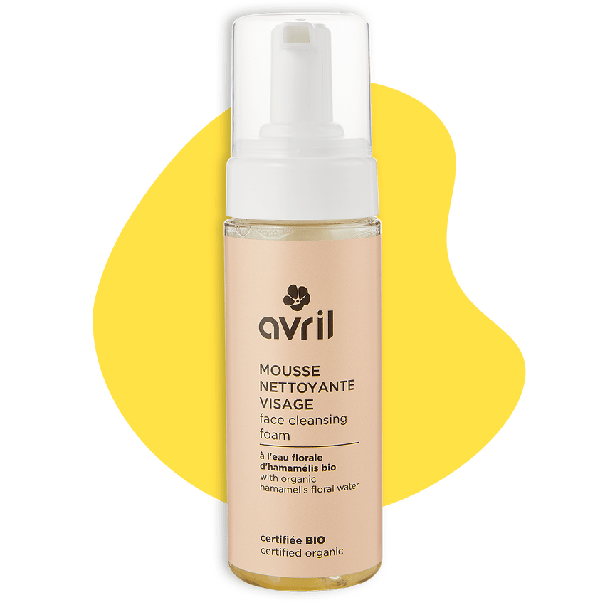 Mousse nettoyante visage de la marque Avril, forme jaune en fond
