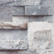 Papier peint intissé Parement pierre naturelle Gris béton