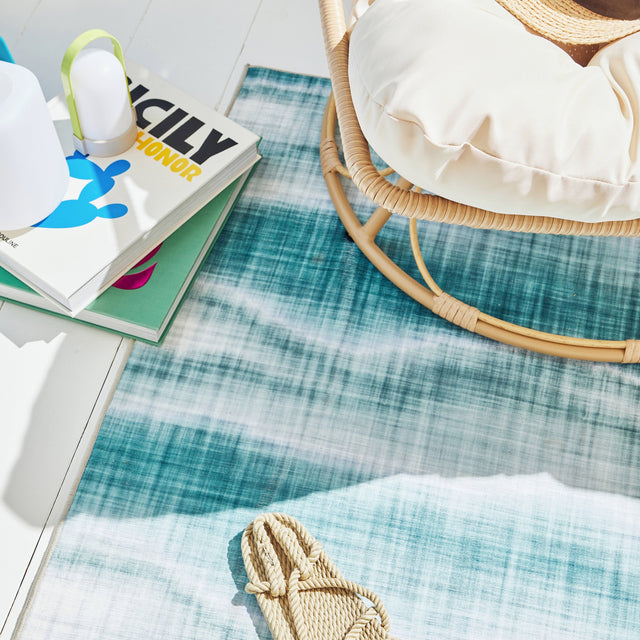 Tapis extérieur SILA coloris bleu turquoise 120 x 160 cm