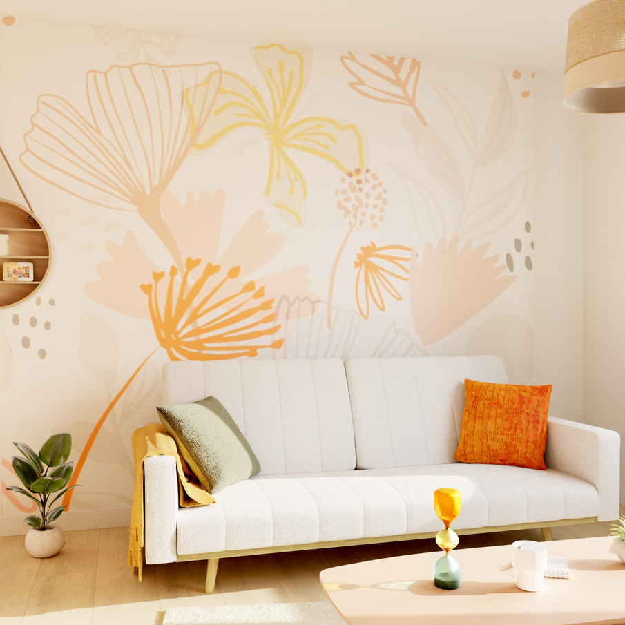 Salon blanc avec papier peint blanc à motif floral jaune, rose et orange