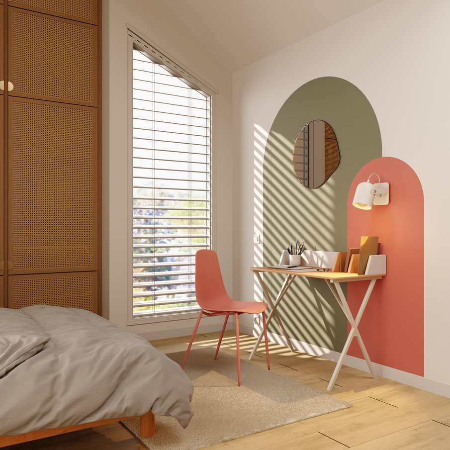 Coin bureau en face du lit dans une chambre, dessin d'arches au mur à la peinture