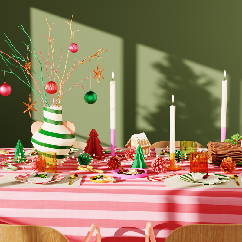 Table de fête pop et colorée avec nappe rayée rouge et rose