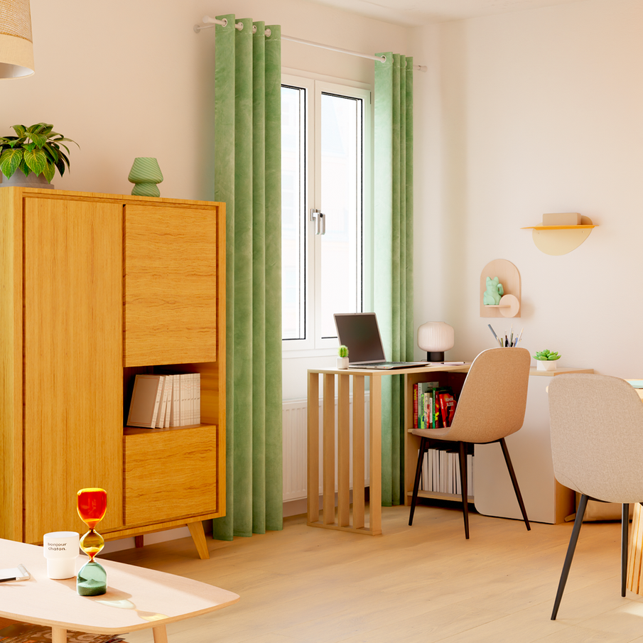 Studio avec coin repas, coin bureau et buffet avec déco en vert, orange et beige