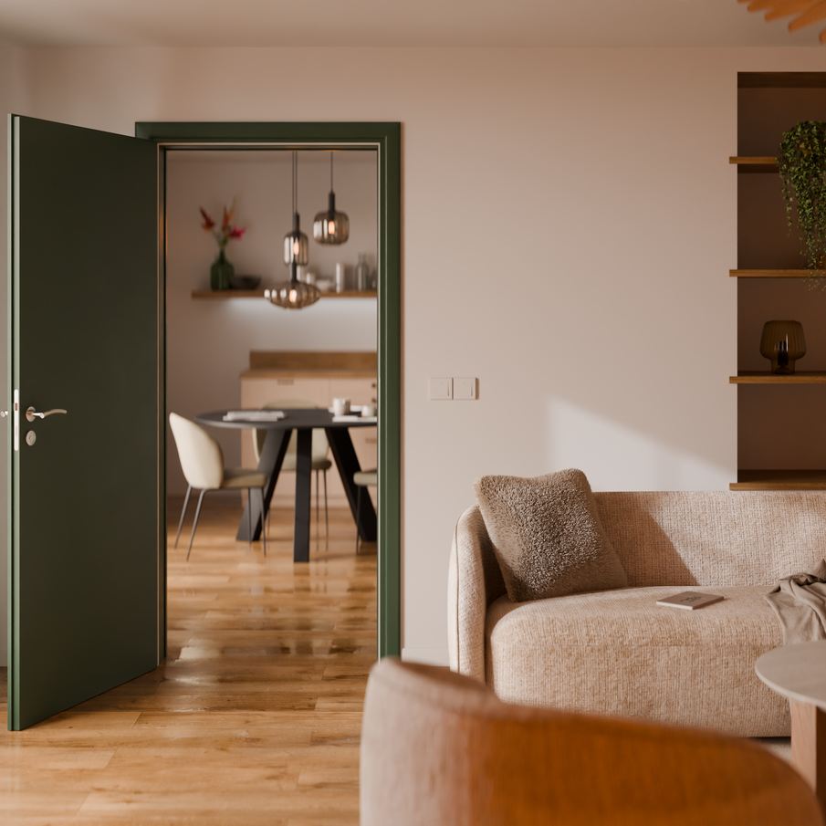 Porte d'un salon peinte couleur vert forêt donnant sur la cuisine salle à manger