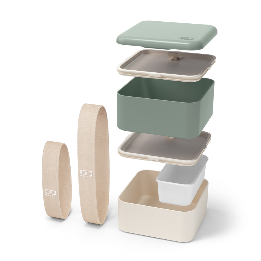 Vue détaillée de chaque élément composant la boite repas carré blanc et vert de la marque Monbento