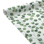 Rouleau déroulé d'un papier peint motif feuillage