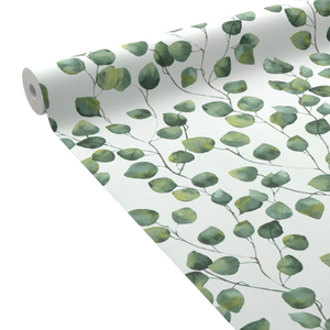 Rouleau déroulé d'un papier peint motif feuillage