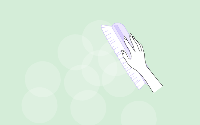 Dessin d'une main qui brosse un mur pour dépoussiérer