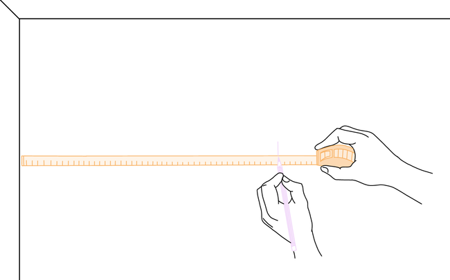 Dessin de main mesurant et traçant des repères sur le mur