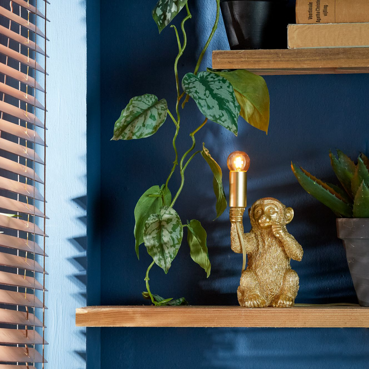 LIGHT & LIVING Lampe à poser Monkey thinker Or