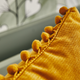 Coussin Bommel Ocre