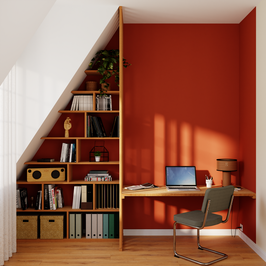 Coin bureau dans le renfoncement d'une pièce, murs peints en rouge terracotta