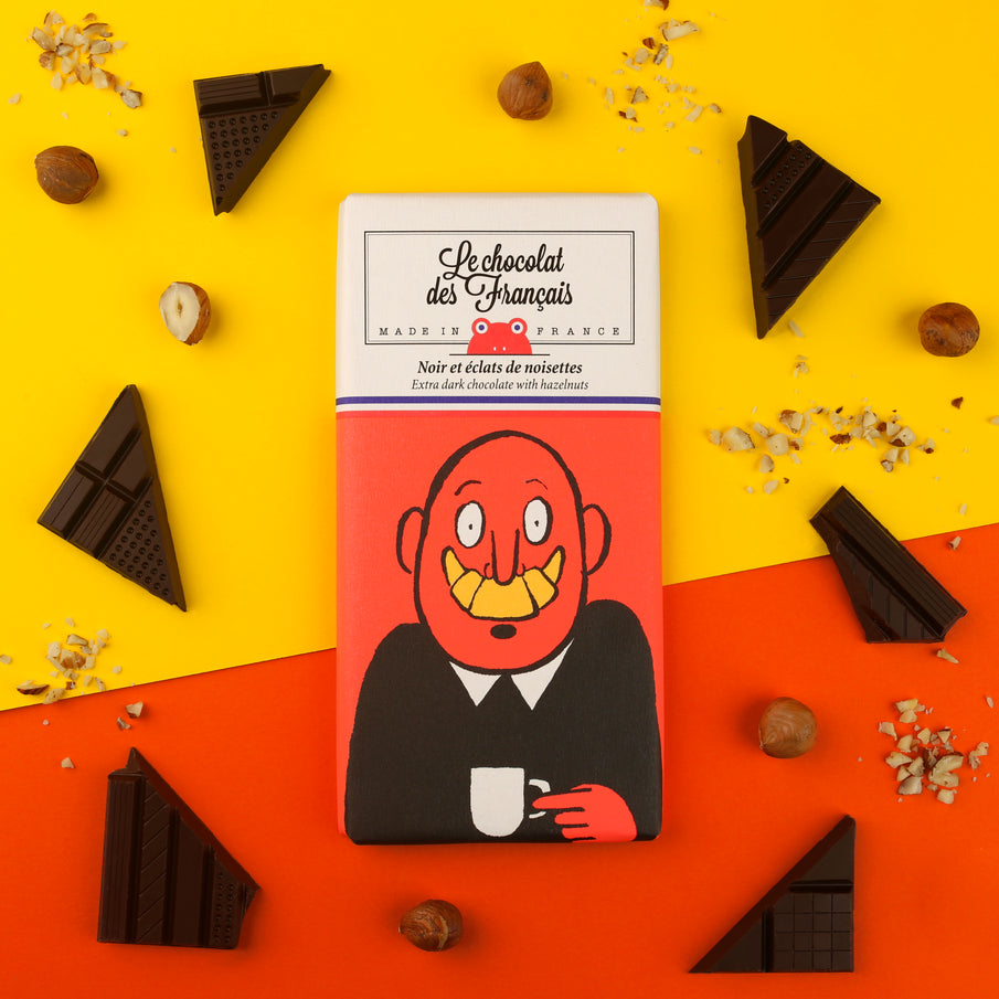 Tablette de chocolat couleur orange illustrée par un monsieur avec une moustache croissant, de la marque Chocolat des Français