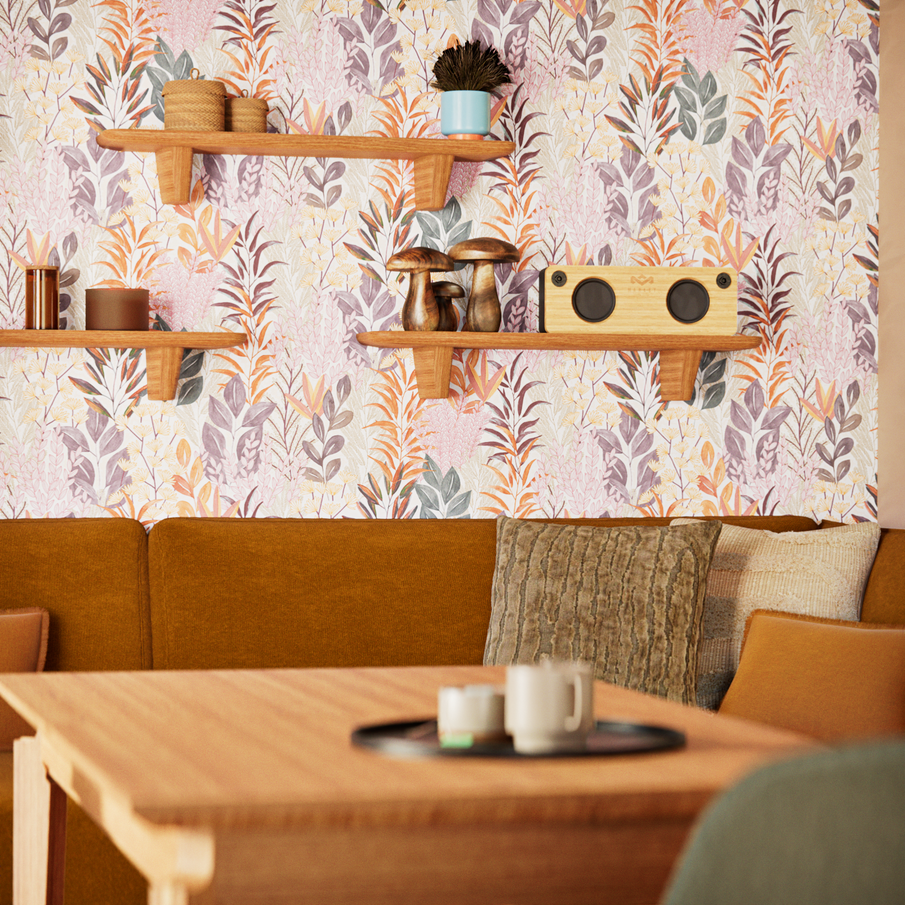 Coin repas avec papier peint feuillage aux teintes orange et violettes