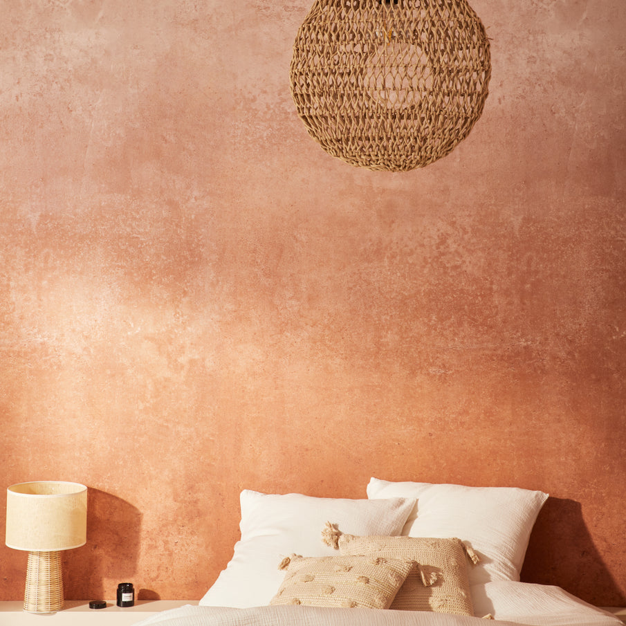 Zoom papier peint effet terre cuite dans chambre à coucher 