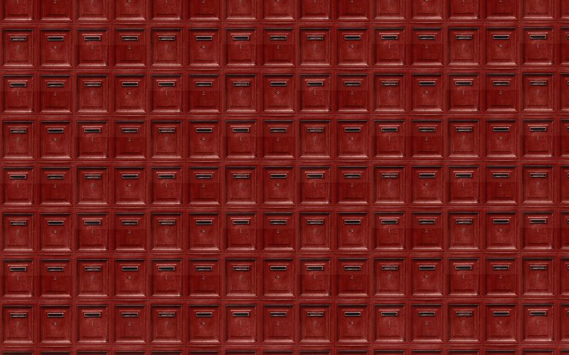 Papier peint intissé POST OFFICE coloris rouge brique