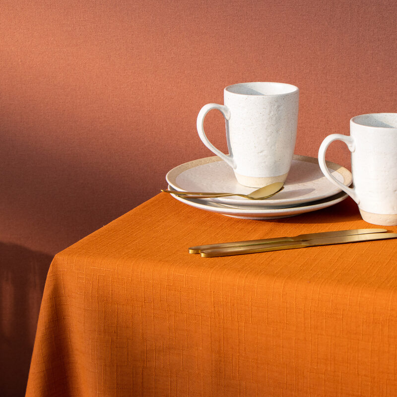 Nappe ACAPULCO coloris orange rouille 165 x 240 cm
